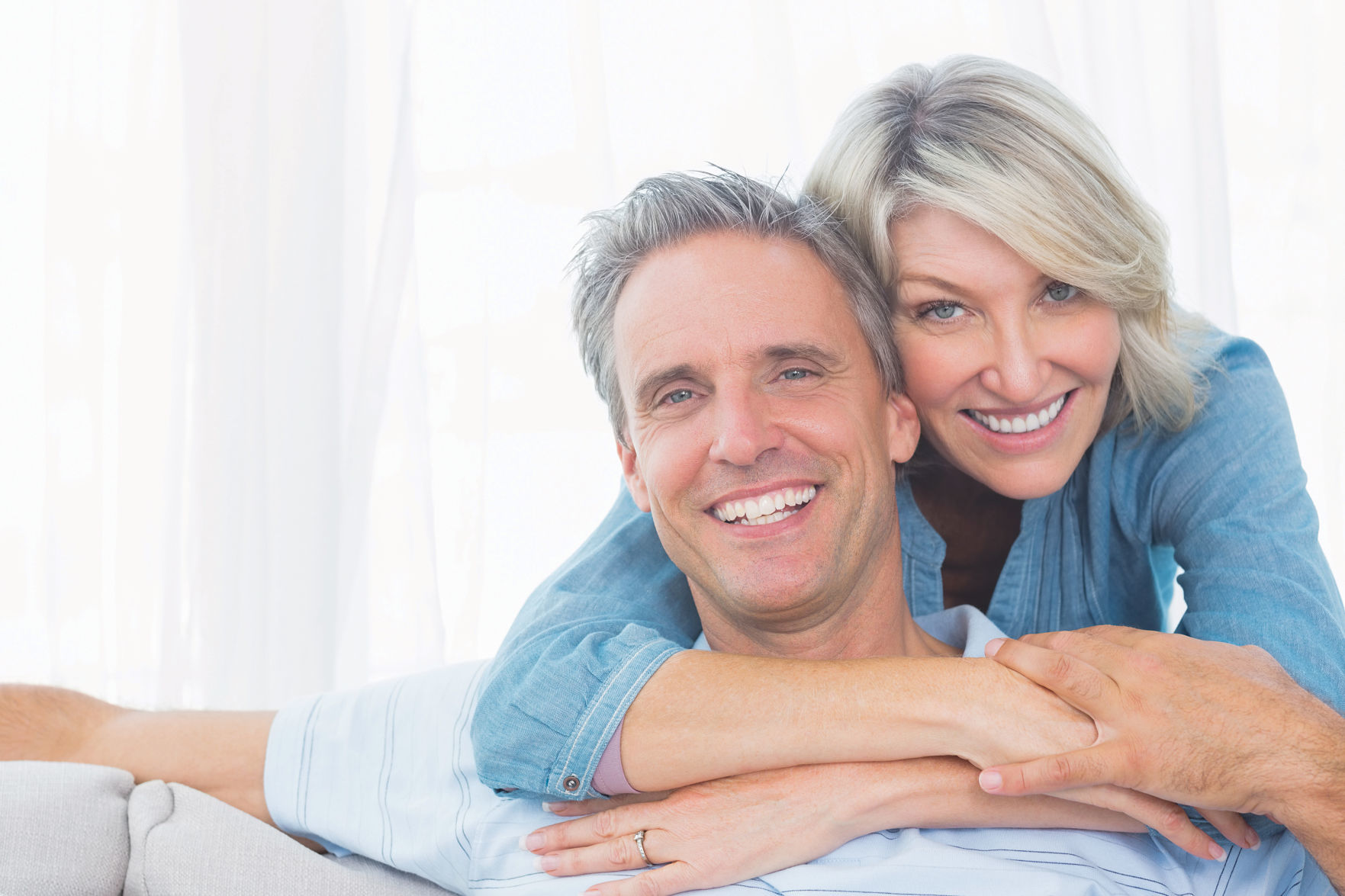 Couple smiling at the camera